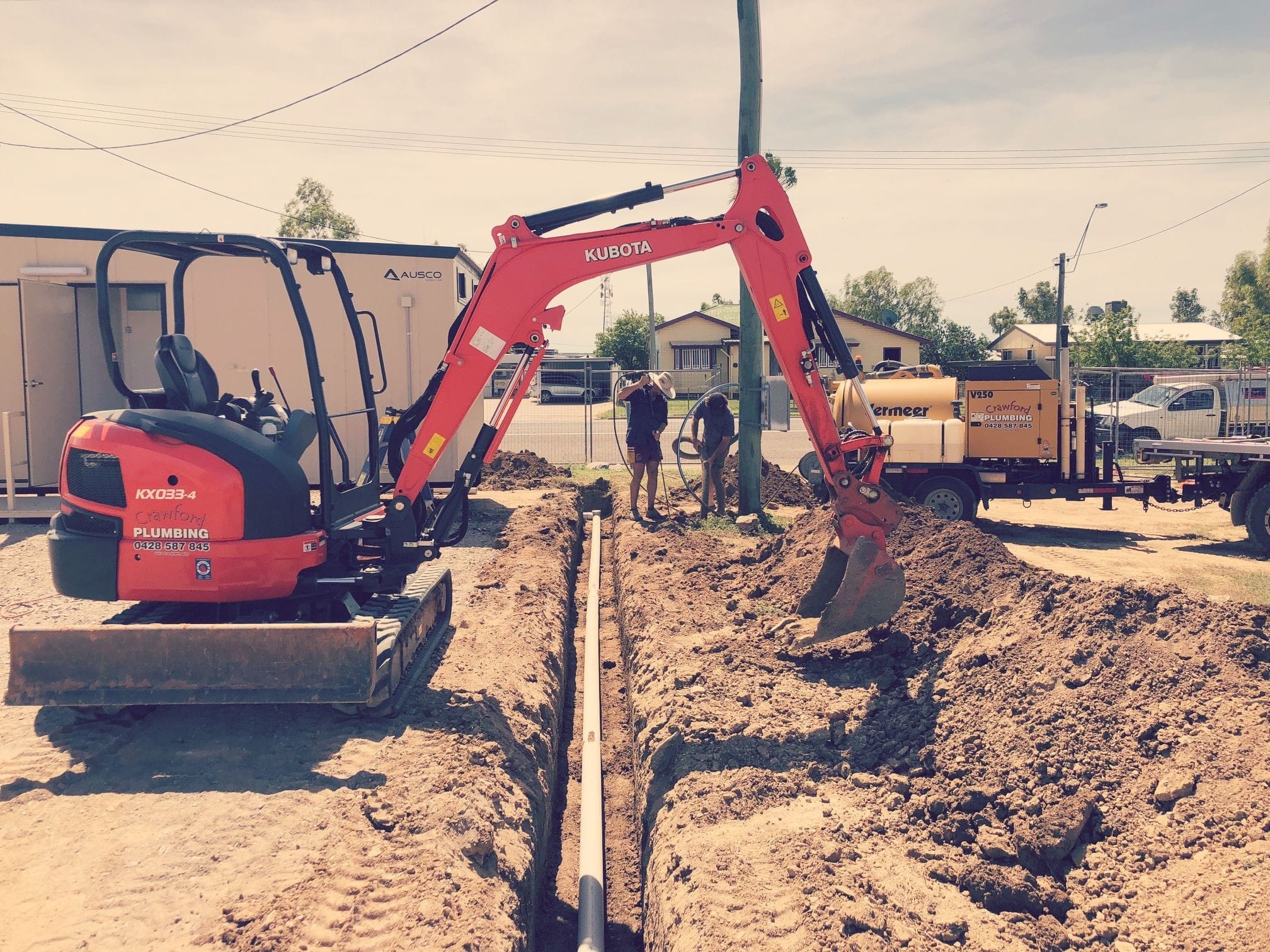 Digging trenches, water tank and water line installation on rural properties.